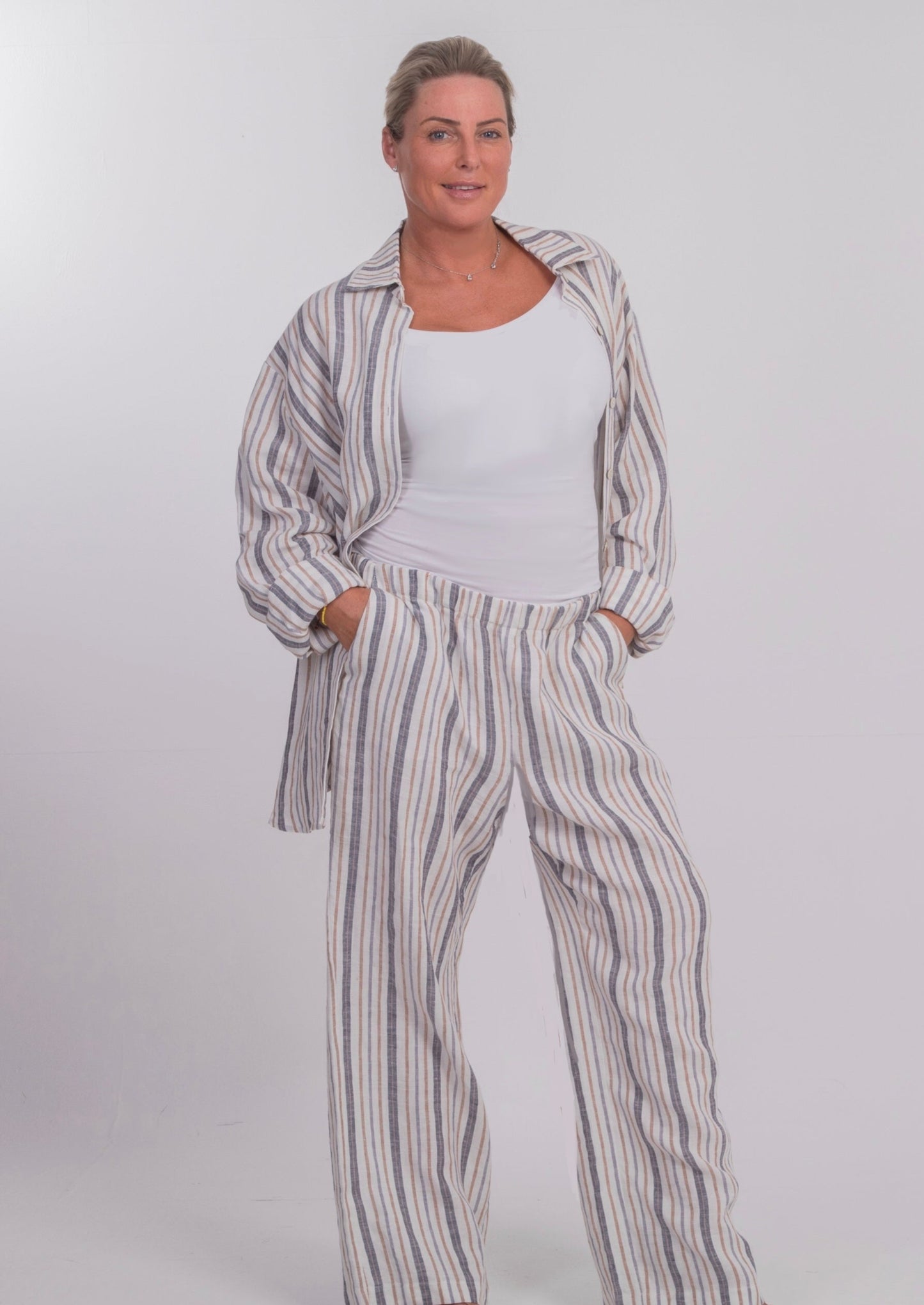 W-THE CAPRI WIDE-LEGGED TROUSERS IN STRIPED LINEN